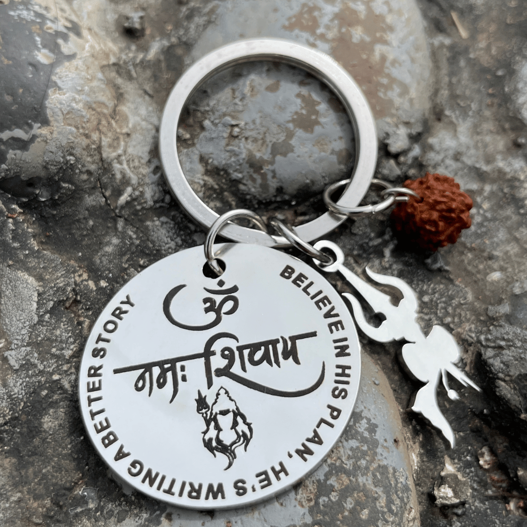 🔱 Om Namah Shivaya Keychain – Believe in His Plan, He’s Writing a Better Story